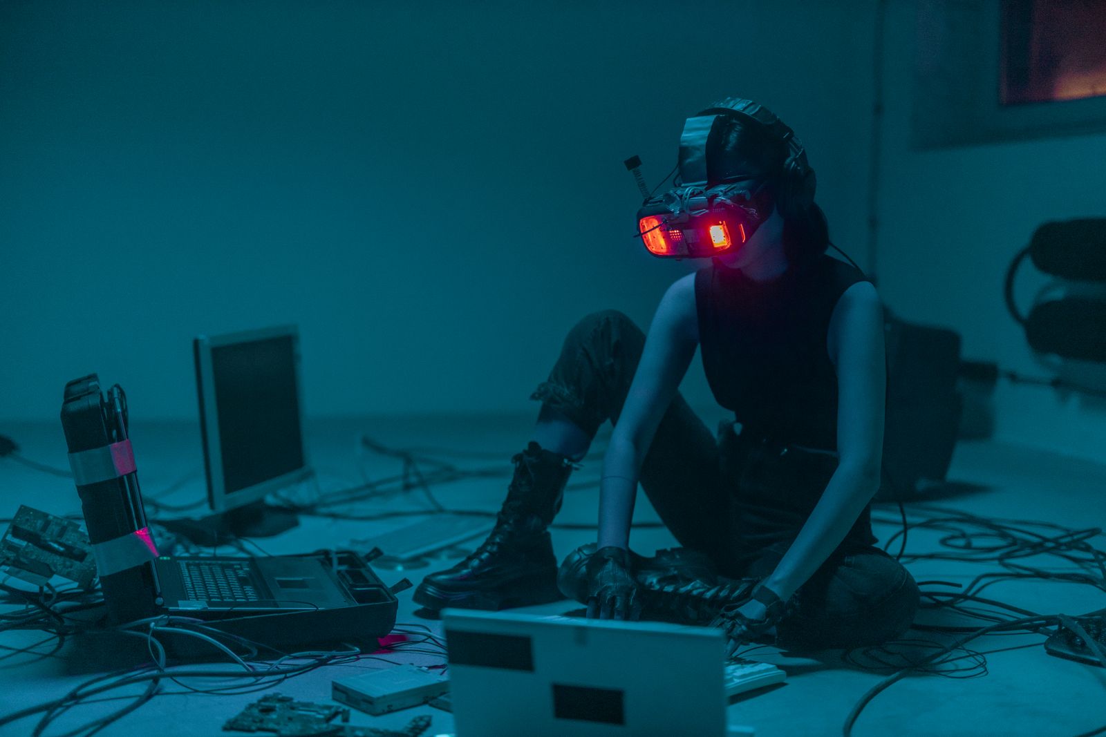 A guest wearing a VR headset reaching out inside the Lost Temple escape quest